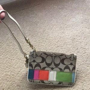 Coach multicolored wristlet. Never used.